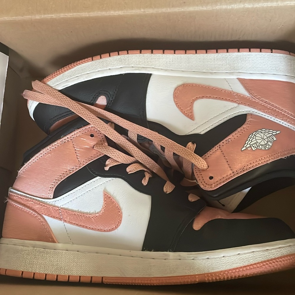 Size 6.5 Y Air Jordan’s, colors: pink, white and black.